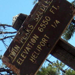 Sign: Twin Peaks Saddle. Elevation 6550 ft.